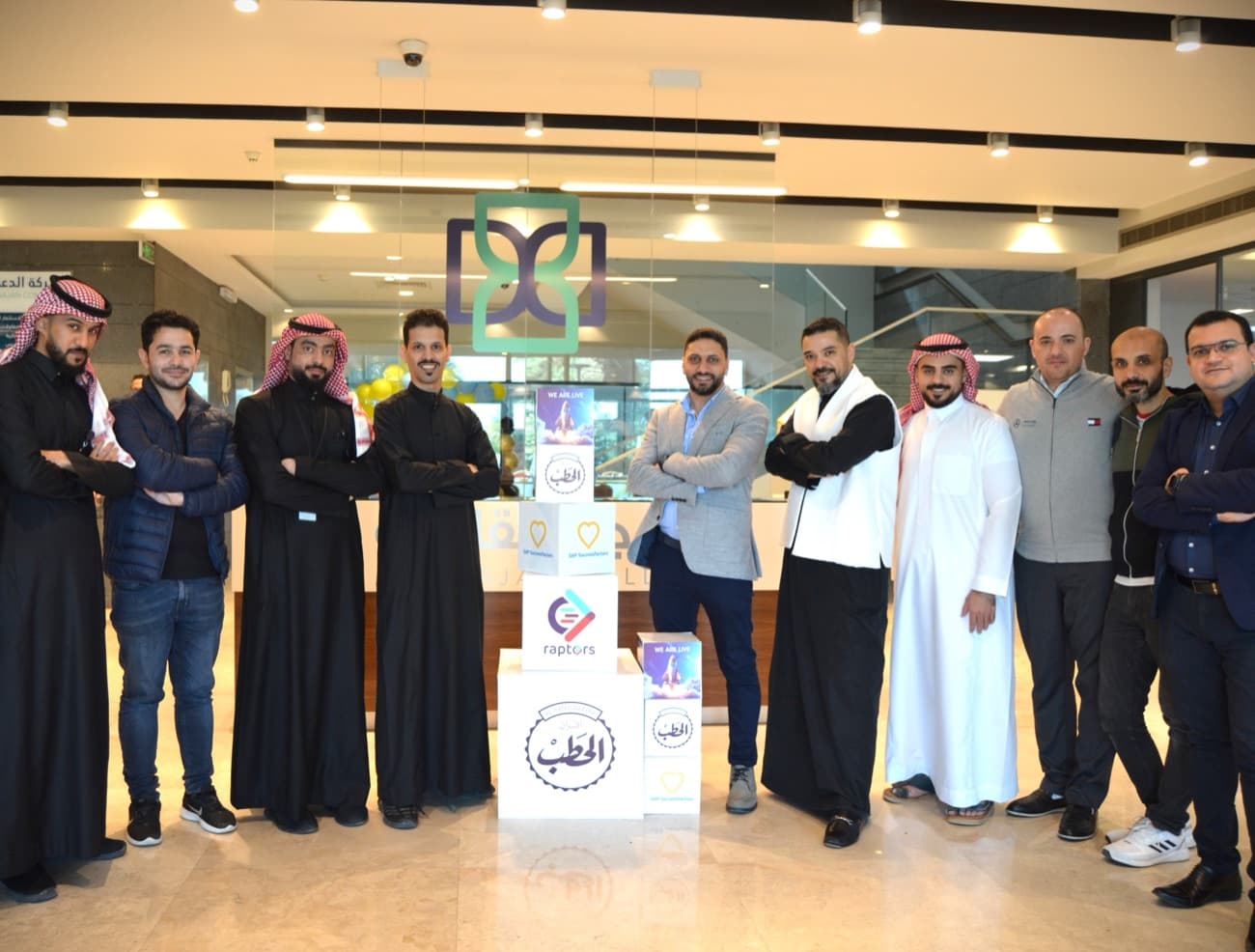 A go-live celebration in the lobby on the morning of launch.